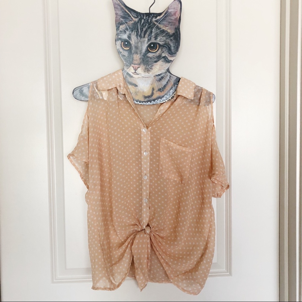 Cute slouchy top with cut outs on shoulders